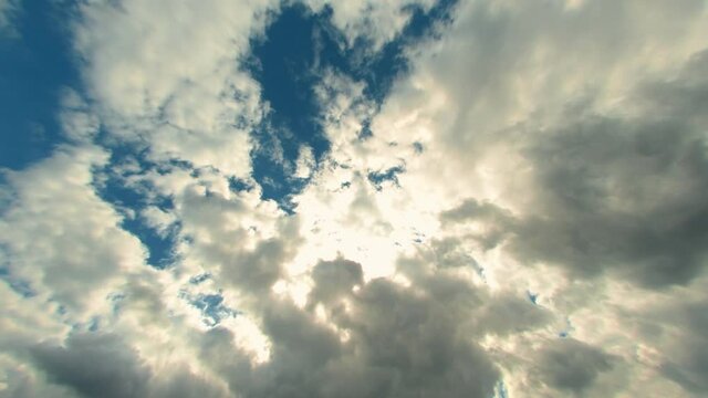 Beautiful sky with cumulus clouds and sun, time lapse. Beautiful blue sky with clouds background. Sky clouds. Sky with clouds weather nature cloud blue. Blue sky with clouds and sun.