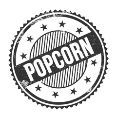 POPCORN text written on black grungy round stamp.