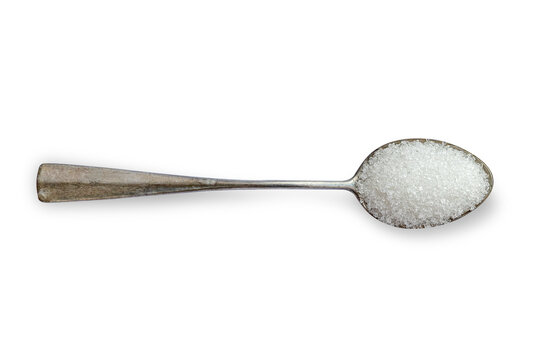A teaspoon with sugar isolated on white background with the clipping path.