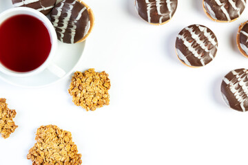 Tea in a cup, with oatmeal cookies, chocolate chip cookies, on a white background, isolated, top view
