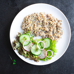 green buckwheat salad vegetables lettuce mix meal snack copy space food background rustic. top view keto or paleo diet vegan or vegetarian food