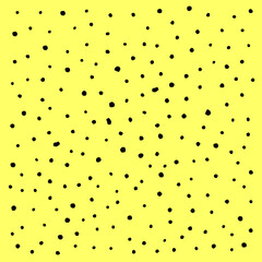 Splashes and drips of black paint on a yellow background.