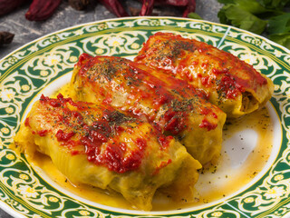stuffed cabbage with meat and tomato . Close up