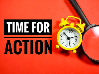 Text TIME FOR ACTION on red background with alarm clock and magnifying glass.Business concept.
