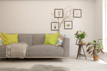 Modern living room in white color with sofa. Scandinavian interior design. 3D illustration