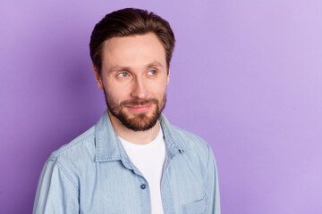 Photo of happy positive good mood lovely man look copyspace dreaming thinking isolated on violet...