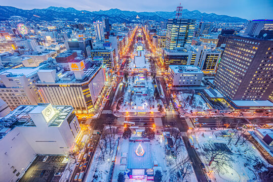 SAPPORO, JAPAN-JANUARY 28, 2020: Odori Park at night view from observation deck of Sapporo TV Tower. The park located in the center of city and designated as main street but eventually became a park.