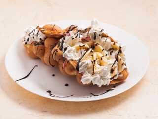 Hong Kong waffle with banana and whipped cream