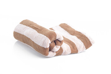 Brown striped towel with white background