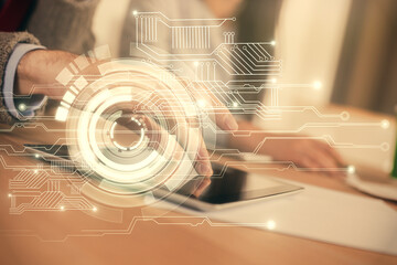 Double exposure of data theme hologram drawing and man and woman working together holding and using a mobile device.