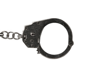 One closed handcuff bracelet isolated on a white background