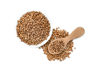dried coriander seeds in ceramic bowl with wooden spoon isolated on white background
