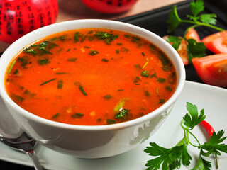 rich Chinese oxtail soup in a white bowl