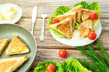 Fast food on wood background, homemade fried food with golden crust