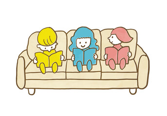 ソファに座って本を読む三人の子どもたち