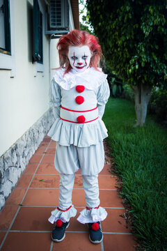 Girl wearing clown costume