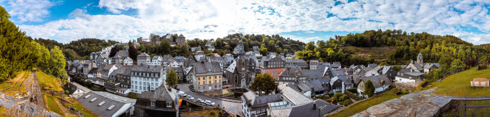 a panorama on a beautiful day with bright sunshine in the beautiful and historic town of monschau. Taken with strong colors in summer. High dynamic range - obrazy, fototapety, plakaty