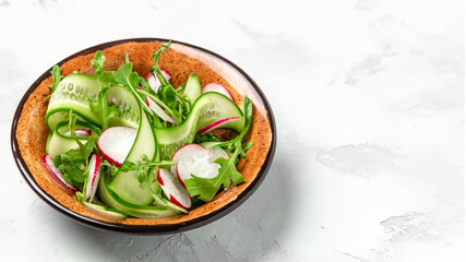 Vegetables salad with radish. Healthy food nourishment diet detox dieting fresh vegetable salad. banner, menu recipe place for text, top view
