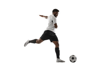 Young African football soccer player training isolated on white background. Concept of sport, movement, energy and dynamic.