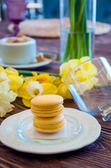 sweet macaroons on a plate in a restaurant