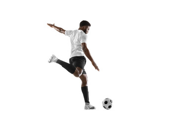 One African man football player training isolated on white background. Concept of sport, movement,...