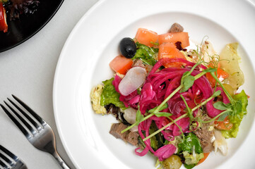 salad with boiled beef and vegetables. Top view