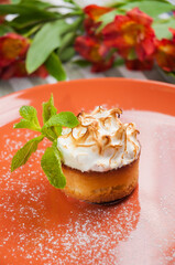 lemon tart with singed meringue. Vertical frame