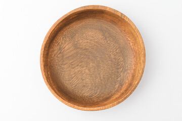 Wooden bowl on white background