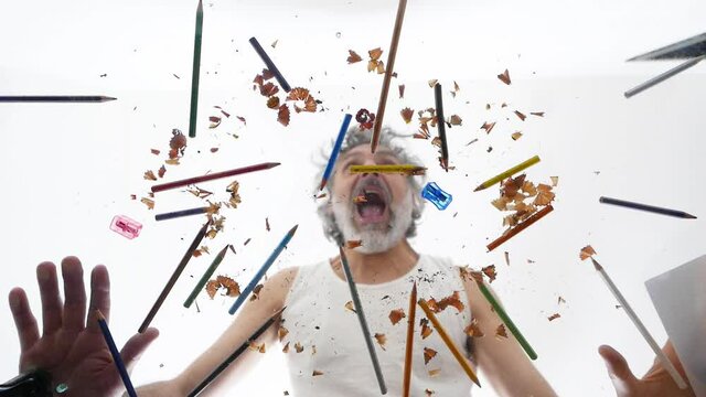 mature artist with pastels creativity concept