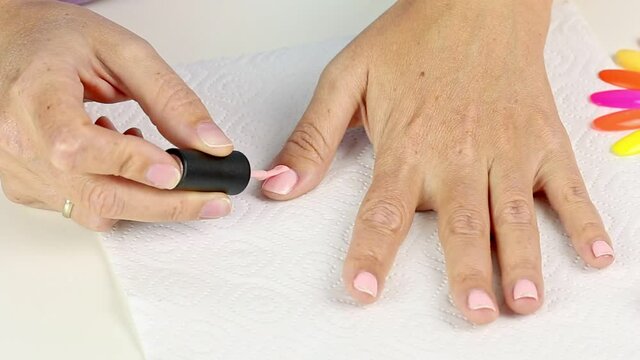 Manicure with led lamp in process. Closeup