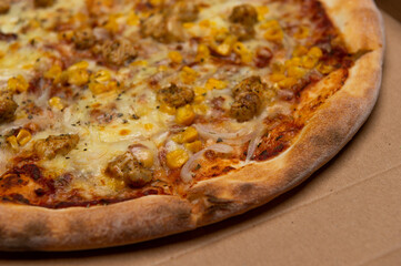closeup of Hawaiian pizza with pineapple