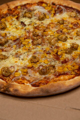 closeup of Hawaiian pizza with pineapple
