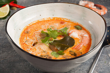 delicious rich spicy Asian Tom Yam soup with seafood