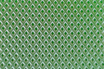 Green rubber surface with triangles and rhombuses