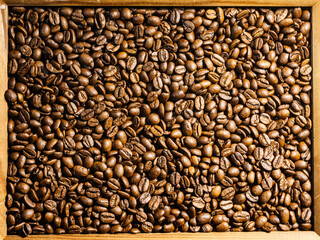 Roasted brown coffee beans frame