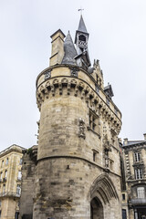 Obraz premium 35 meters Bordeaux Cailhau gate (Porte Cailhau, 1494) - medieval gate at Place du Palais. Gate built in Gothic Style and celebrates victory at Fornovo. Bordeaux, Gironde, Aquitaine, France.