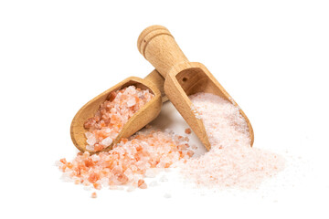 Coarse and fine Himalayan salt on wooden shovels isolated on white background