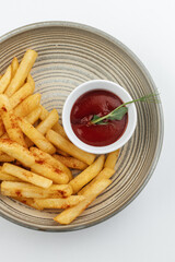 French fries with sauce on a plate