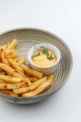 French fries with sauce on a plate