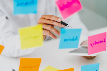 Group of startup team coworking with new creative project plan..