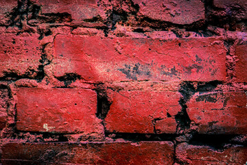 Red and old brick wall. Close up view