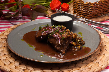 boiled beef with vegetables and sauce in the restaurant