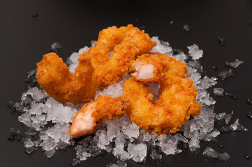 breaded shrimp on ice-a contrasting combination of hot and cold