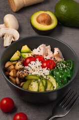 poke with chicken and mushrooms, avocado, broken cucumbers and tomatoes