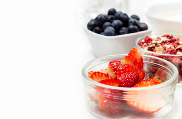 Ingredients for a healthy breakfast. Muesli, berries and yogurt. Healthy eating. Sports fitness menu. Concept. Copy space. High quality photo