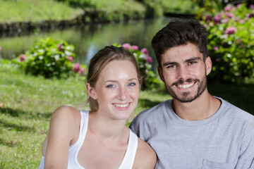 Fototapeta premium beautiful young couple on the lake background