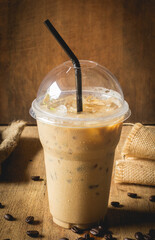 Cold Coffee On Wooden table and coffee bean