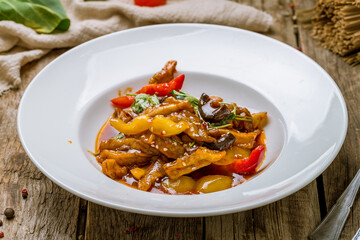 fried eggplant in sweet sour sauce with vegetables, chinese cuisine