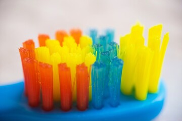 Close up macro of colorful bristles Toothbrush background
