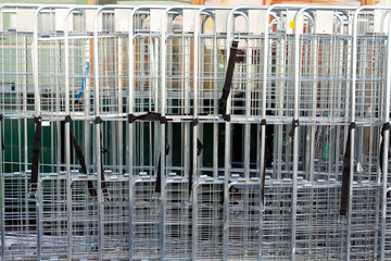 Metal cargo carts near supermarket